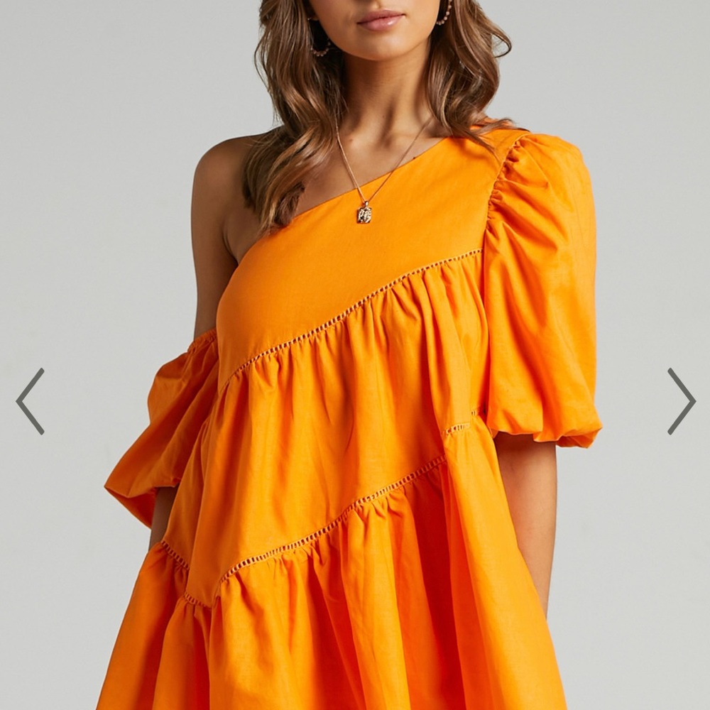 HARLEEN MINI DRESS - ASYMMETRICAL TRIM PUFF SLEEVE DRESS IN ORANGE